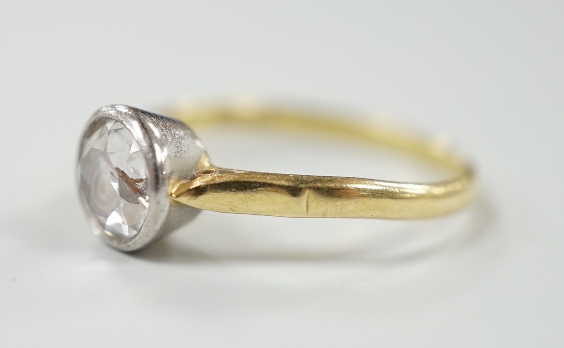 A modern 18ct gold and collet set solitaire diamond ring, size N, gross weight 3.1 grams, the stone diameter approx. 6.1mm